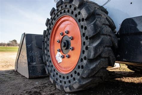 solid skid steer tires vs pneumatic|turf tire for skid steer.